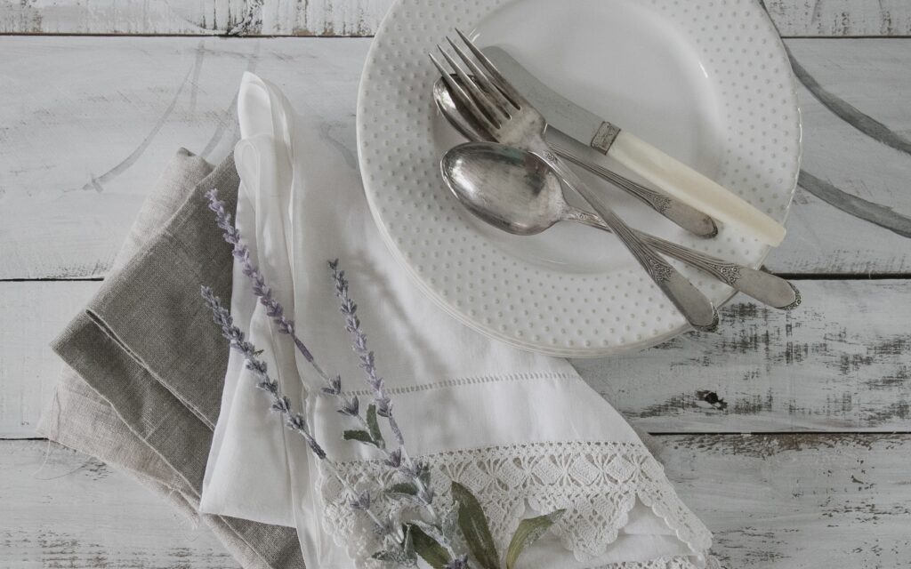 Monochrome tablecloth and plate set up.
