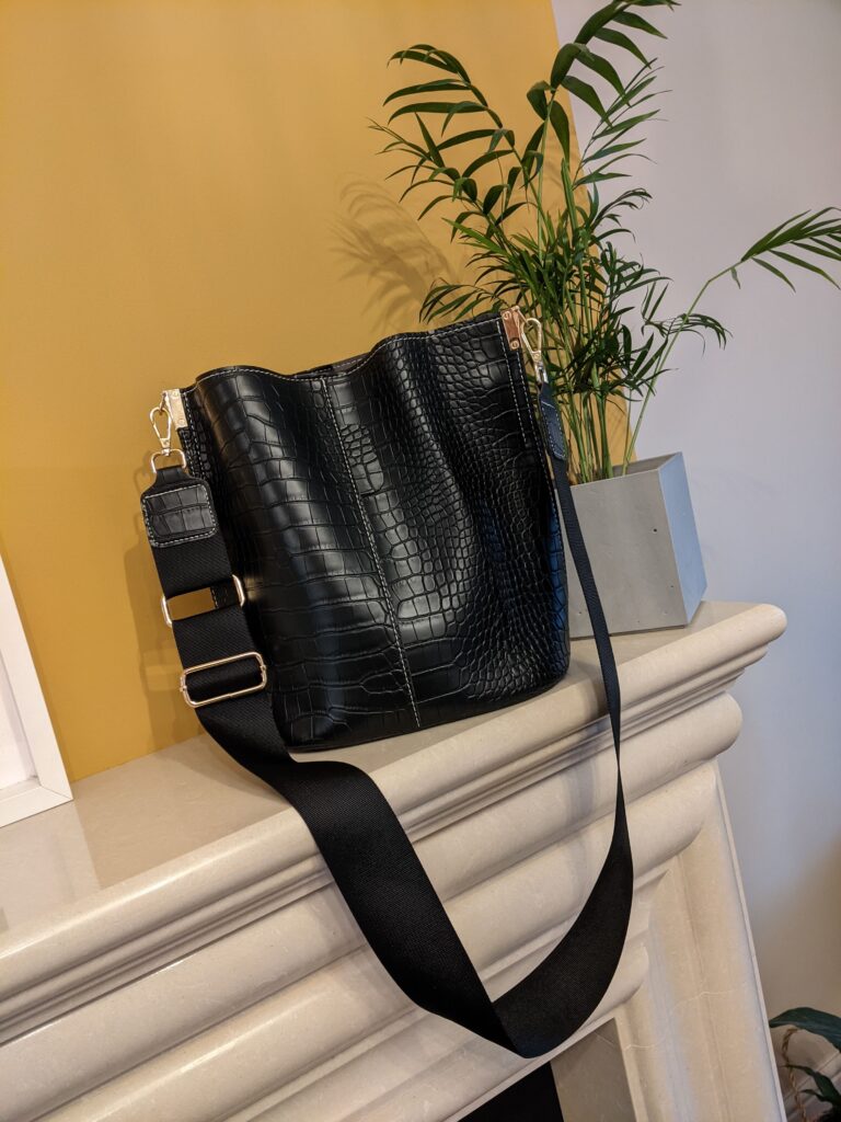 Black croc cross body bag from Masha Hasel.