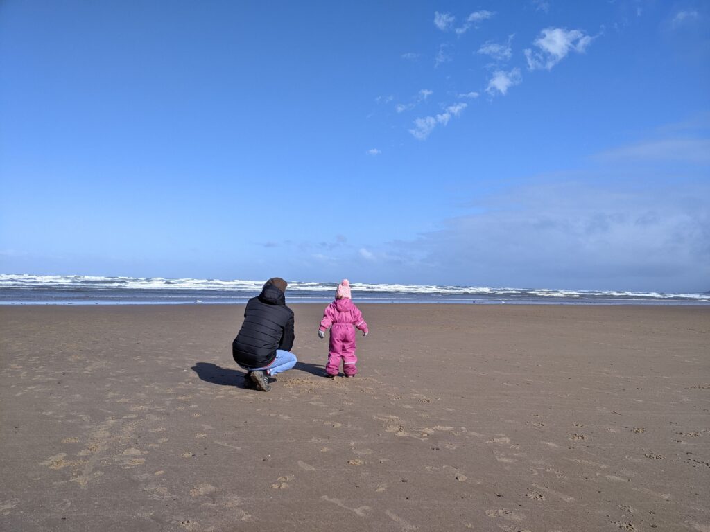 Saltburn beach with my husband and daughters.