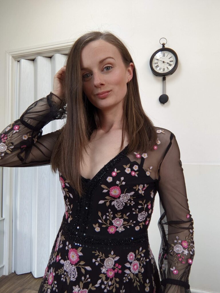 Claire Mac wearing a second hand French Connection dress.