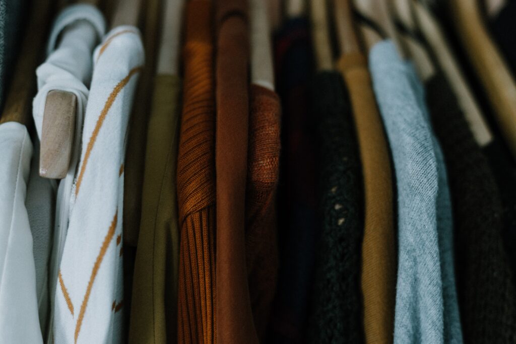 Autumnal tones on a clothes hanging rail.