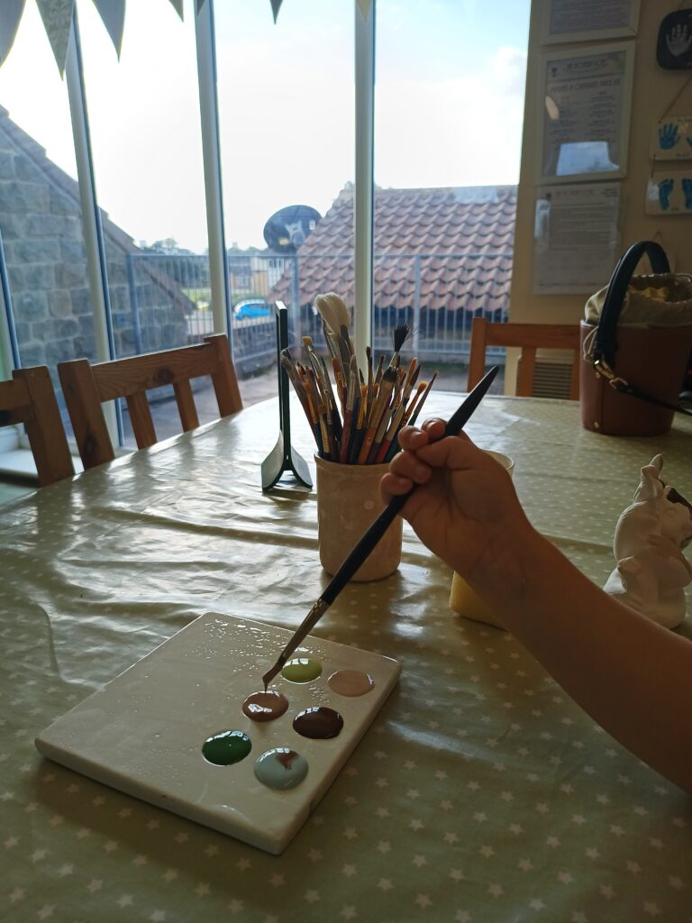 My daughters artist palette at the Pottery Loft.