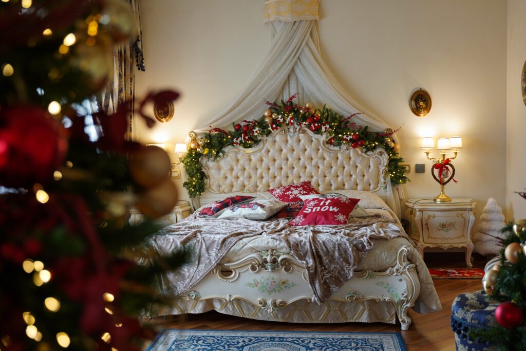 A hotel bedroom suite dressed for Christmas.