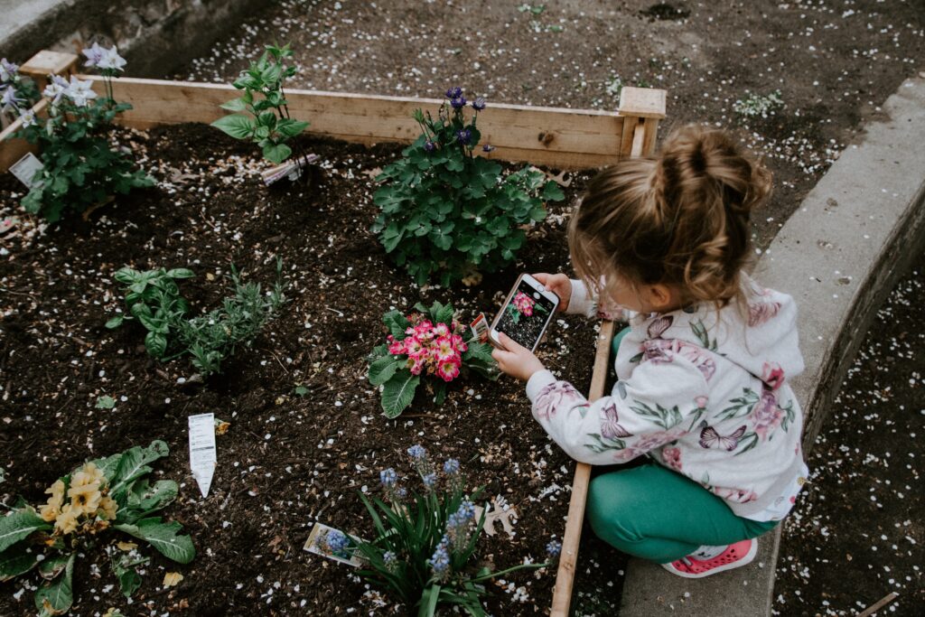 Child gardening. This is just one of five unique hobbies for children.