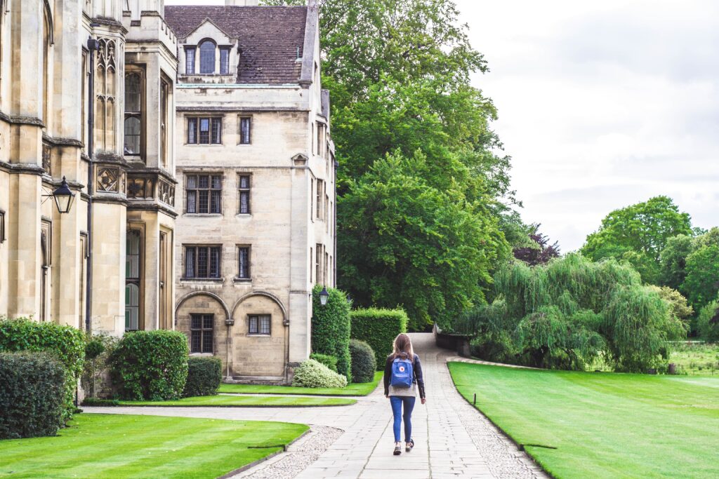 Child walking into boarding school.