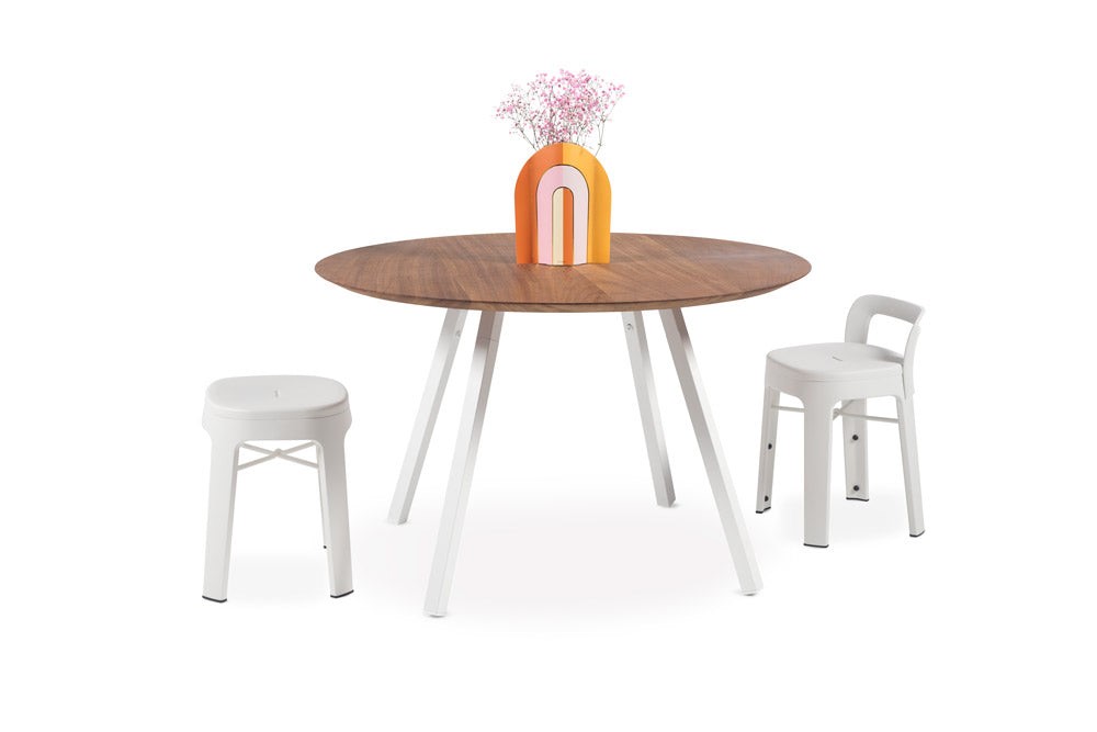 Small dining tables examples. White stools, wooden top.