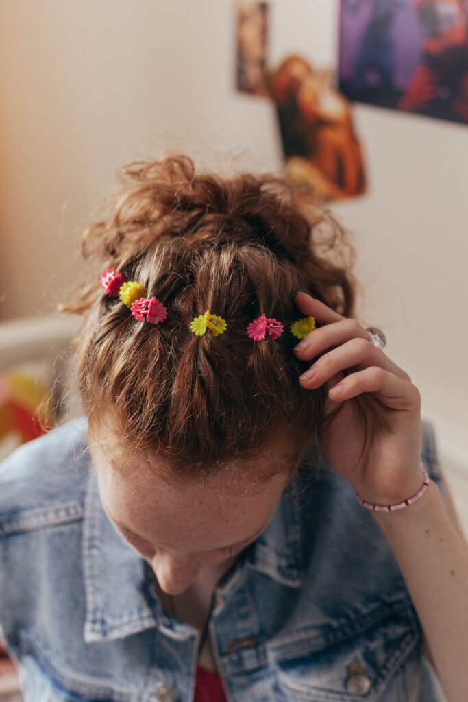 Butterfly clips being used to accessorise y2k outfits.