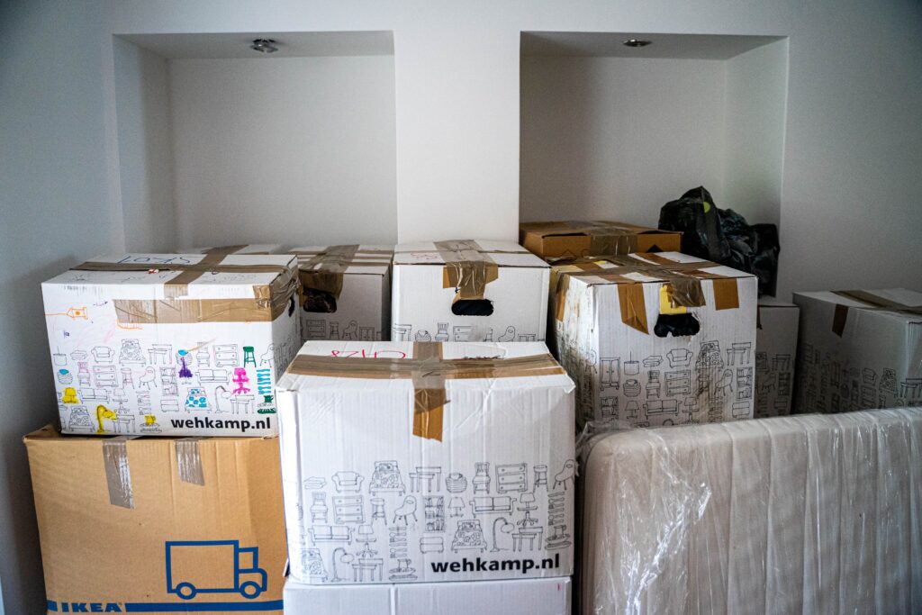 Boxes piled up ready for a house move. This is to go with an article detailing how moving fragile items can be done safely.