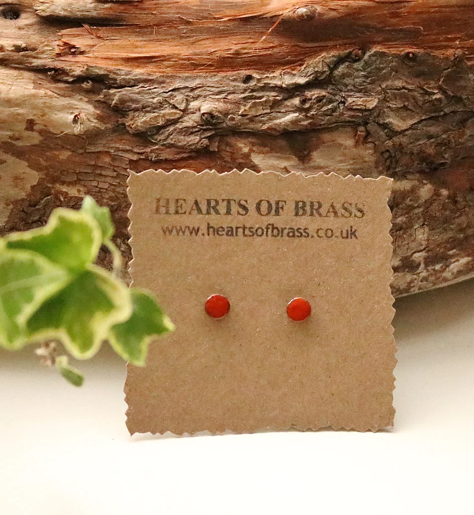 Hearts of Brass enamel red earring studs.