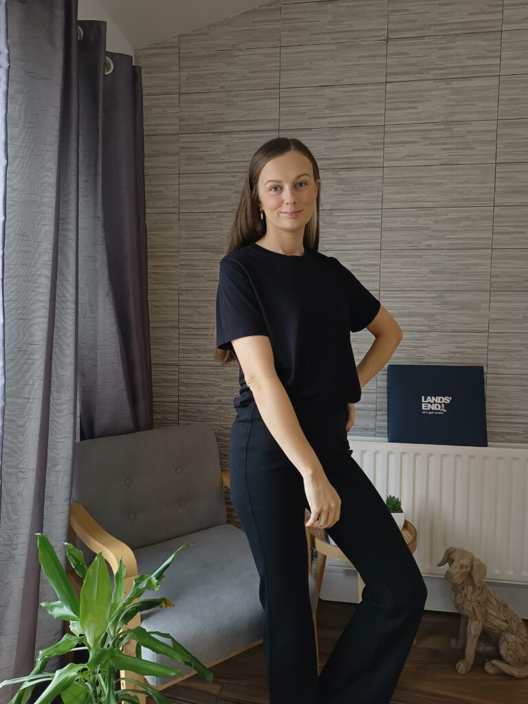 Claire Mac wearing black fleece lined trousers from Land's End.