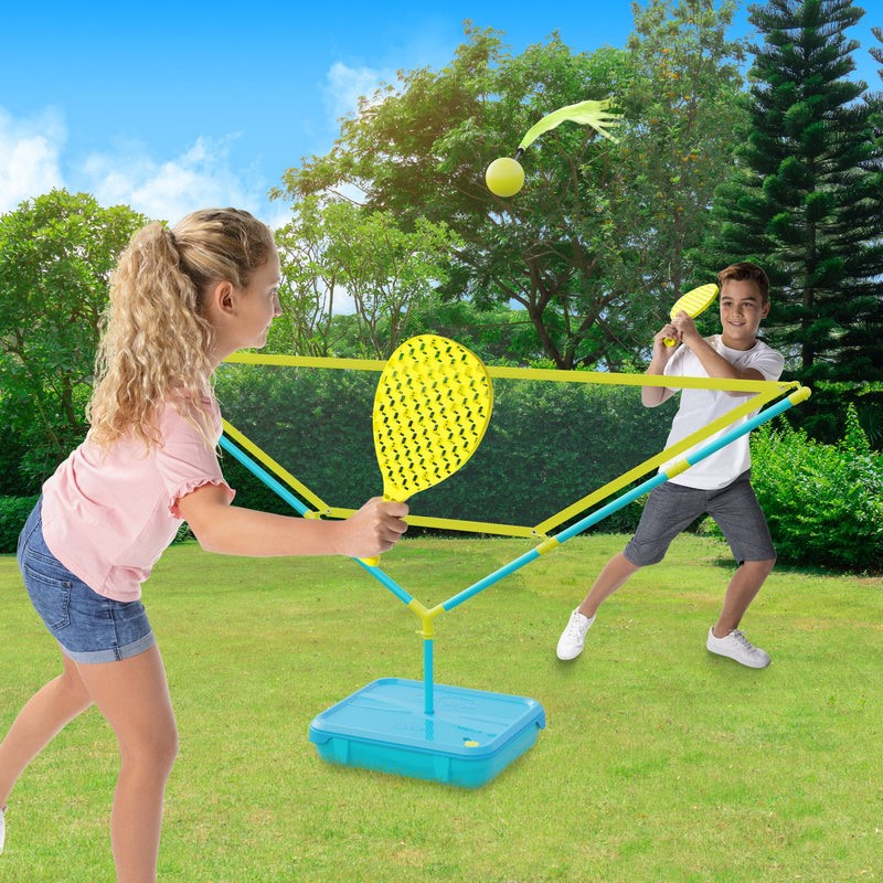 Children playing with bat and ball outside.
