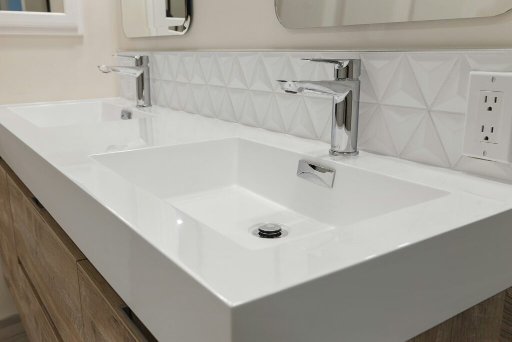 Double sink in accessible bathroom.