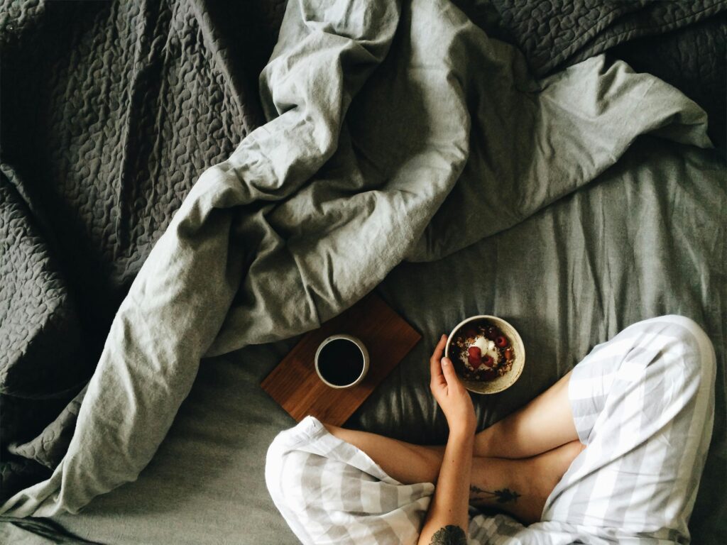 The art of layering to create a cosy bed.