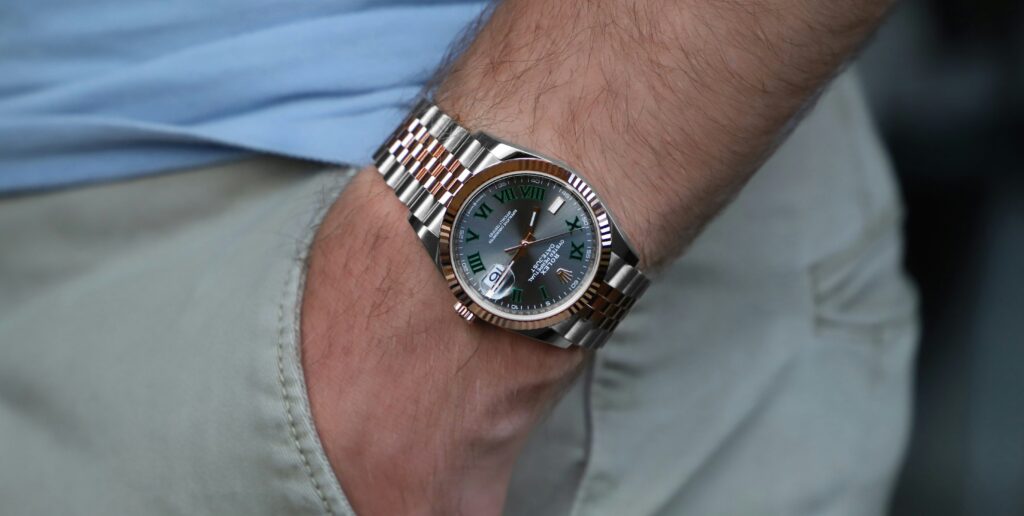 Man wearing a Rolex watch. This is to go with an article about watch part-exchange.
