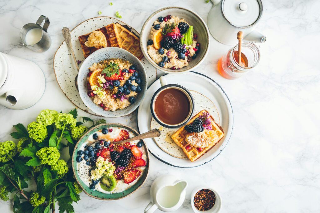 Selection of rainbow coloured food.