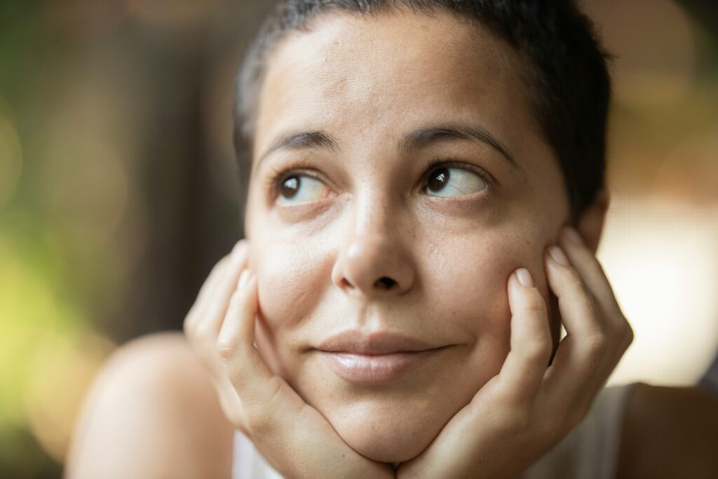 Close up image of a woman's face. This is to go with an article exploring rhinoplasty.