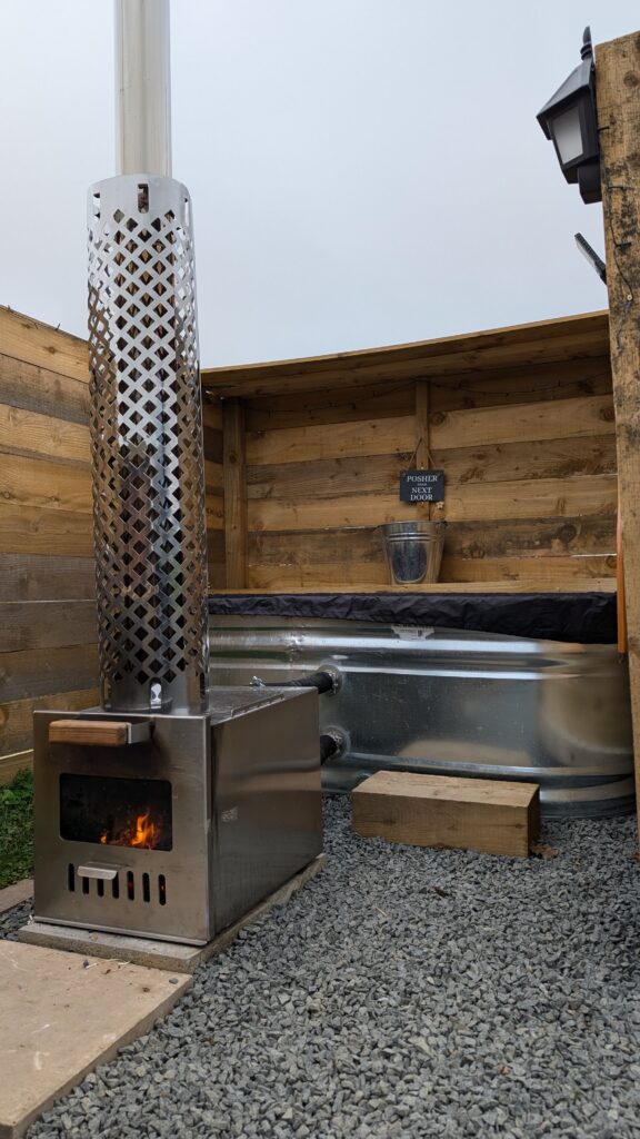 Outdoor log fired tub at Wyke Lodges.