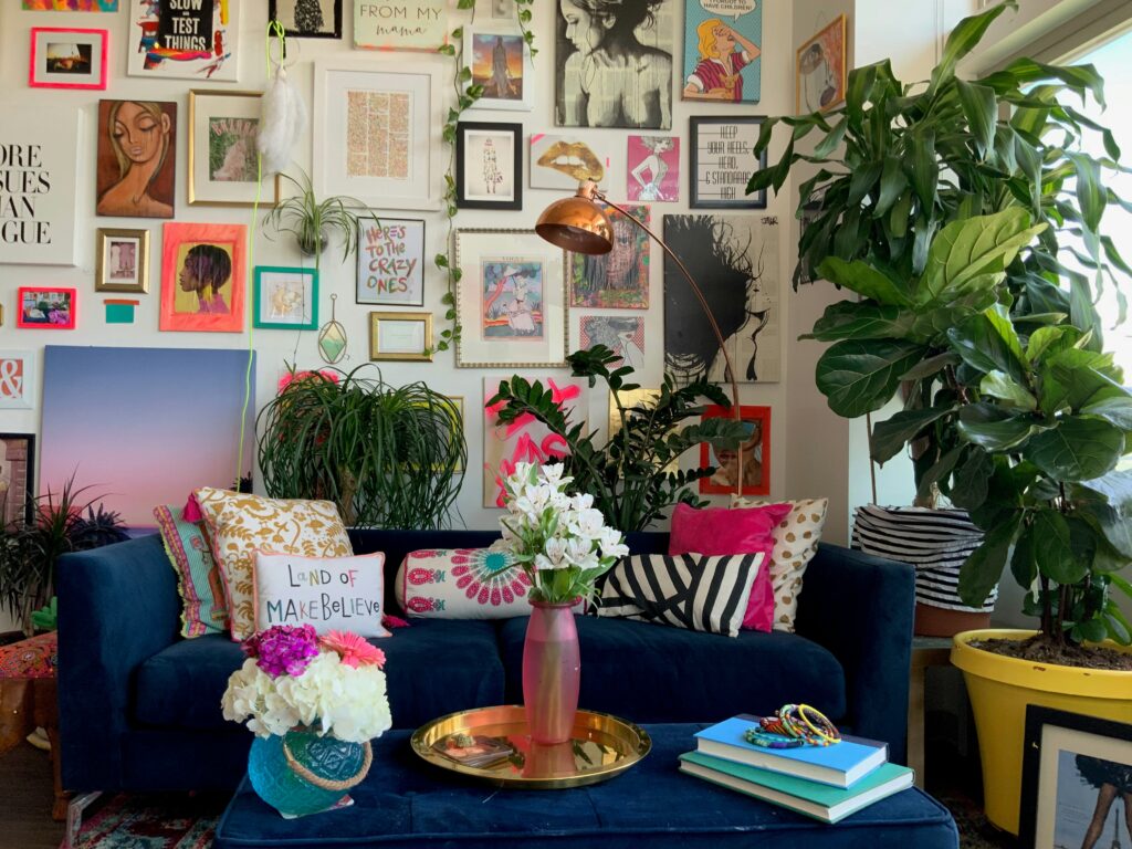 Bold prints on gallery wall in living room.
