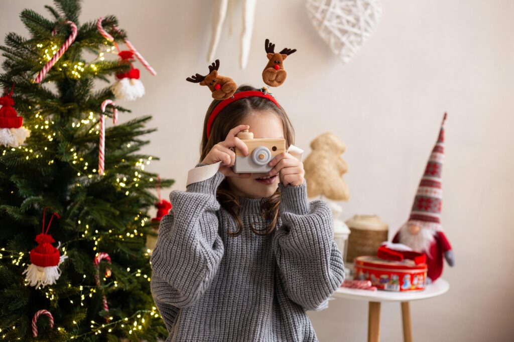 Girl at Christmas time. This is to go with an article discussing 5 ways to make the best family christmas memories.