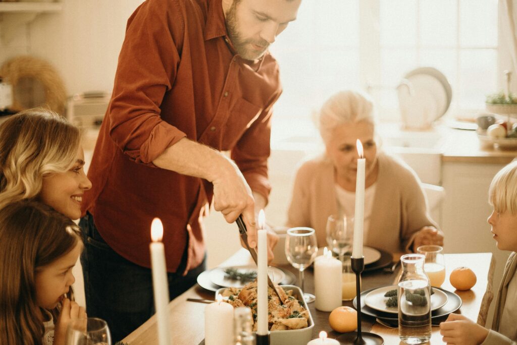 Family around the table at Christmas.