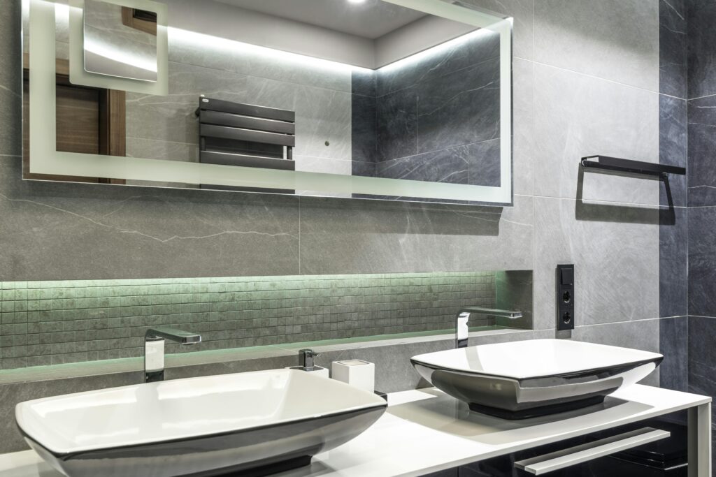 Double sink in minimalist bathroom.