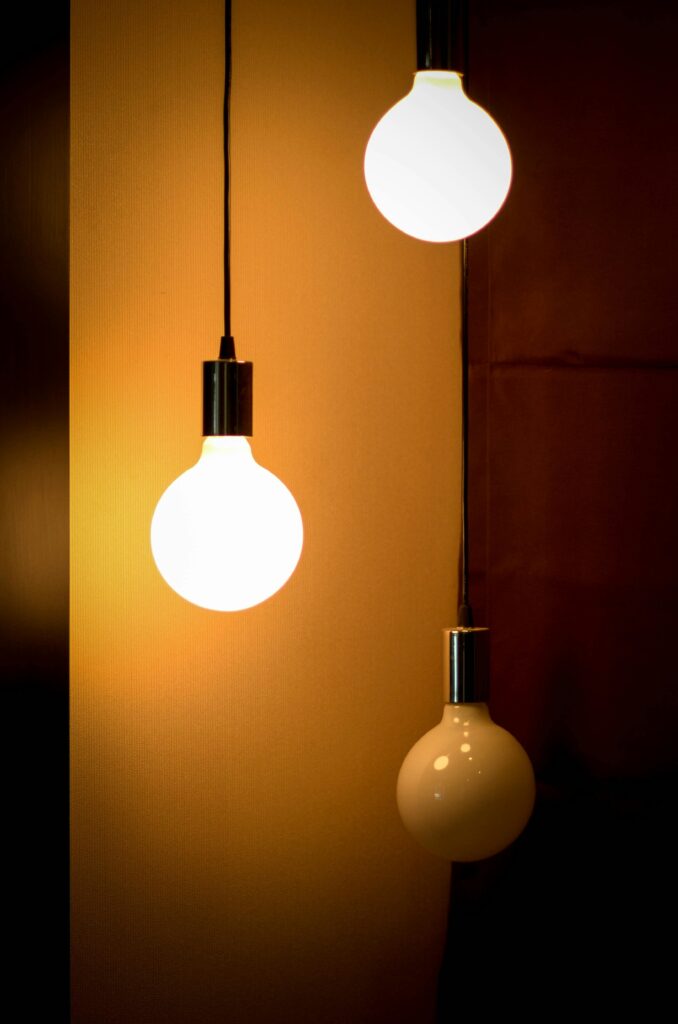 Circular overhead lamps.
