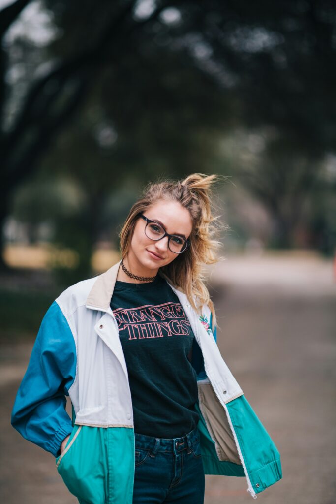 Woman wearing a stranger things top. This is to go with an article expressing 5 ways you can embrace your inner geek.