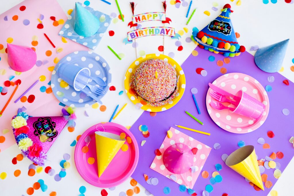 Kids five and thriving party decor.