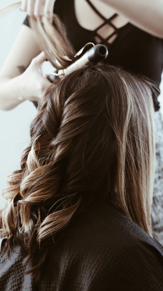 Curling hair.