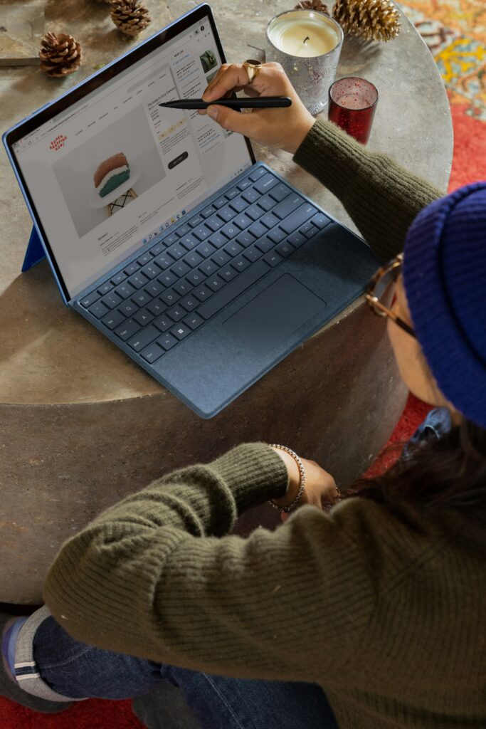 Person working on a laptop. This is to go with an article discussing how to take your small business into the European market.