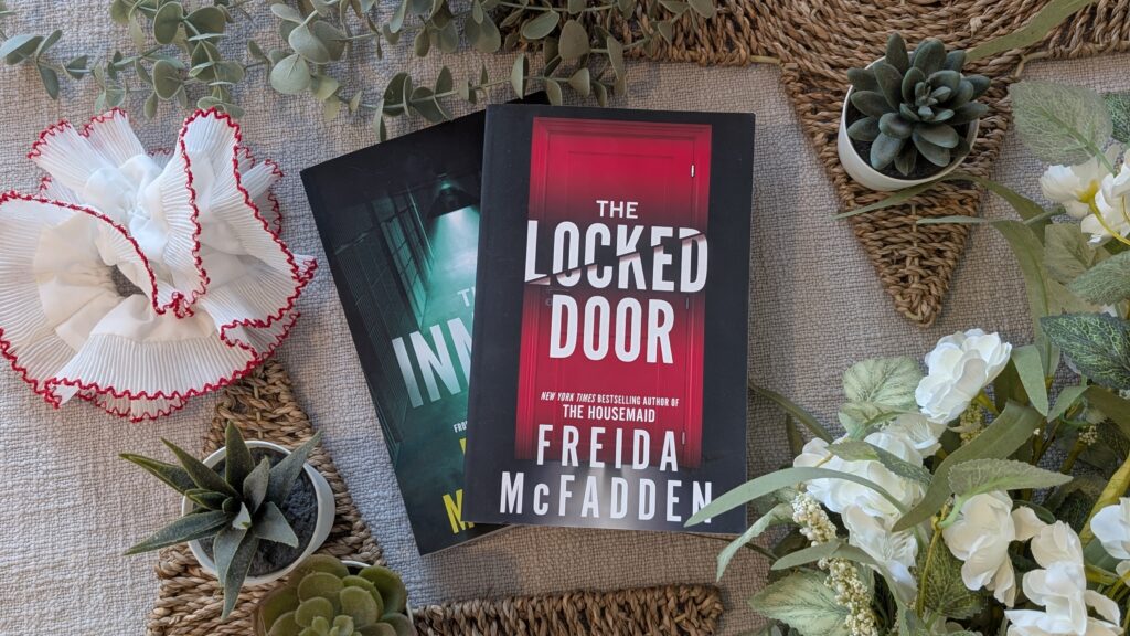 Book cover of The Locked Door by Frieda McFadden.