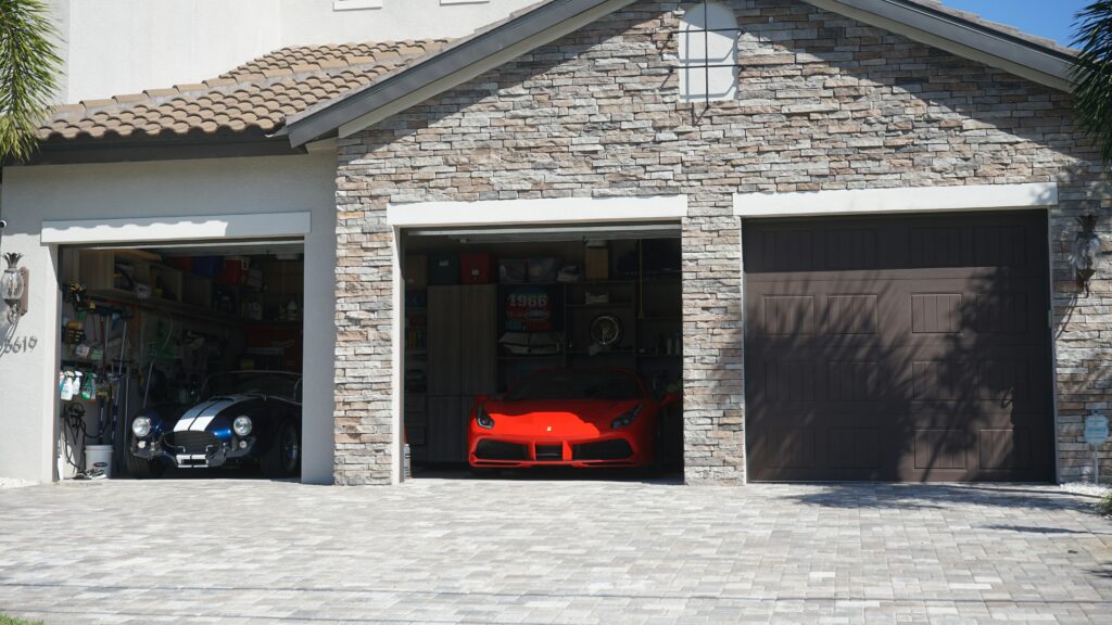 Three door garage. This is to go with an article discussing budget flooring ideas for your garage.