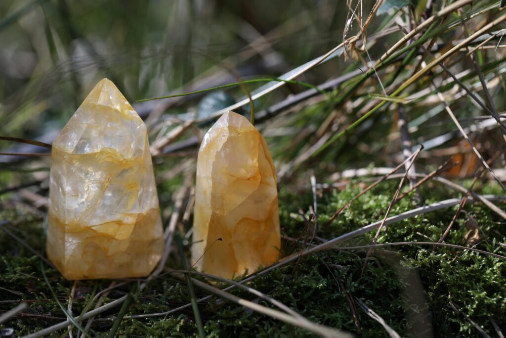 Two citrine crystal stones.