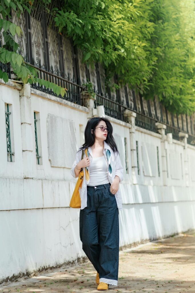 Lady walking down the street with effortless style.