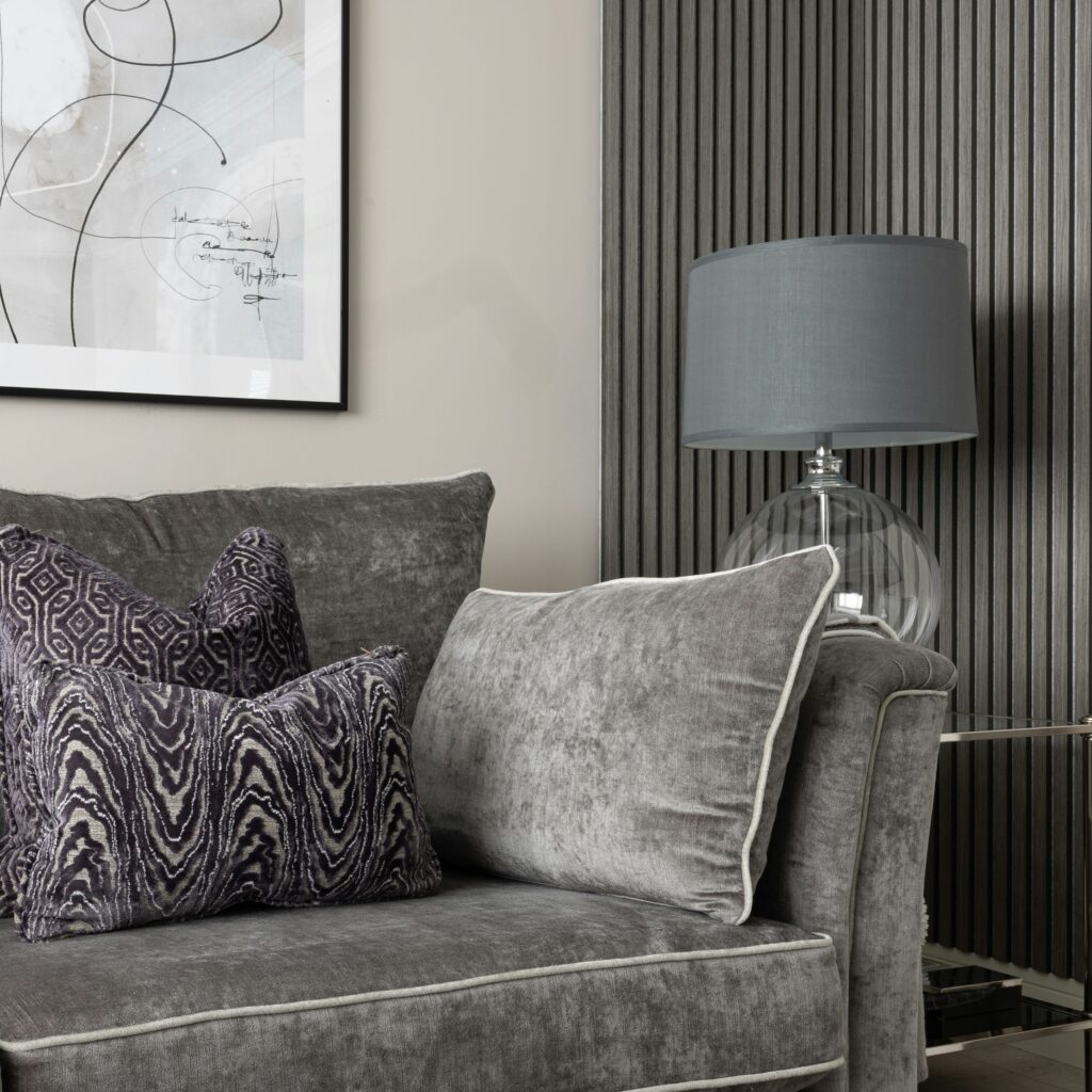 Wooden wall panelling in a living room setting.