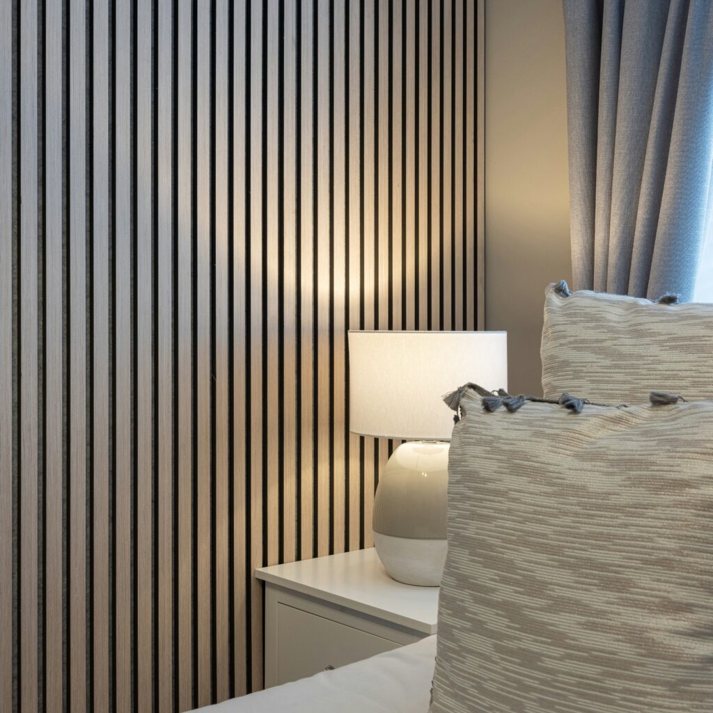 Wood wall panelling in a bedroom setting.