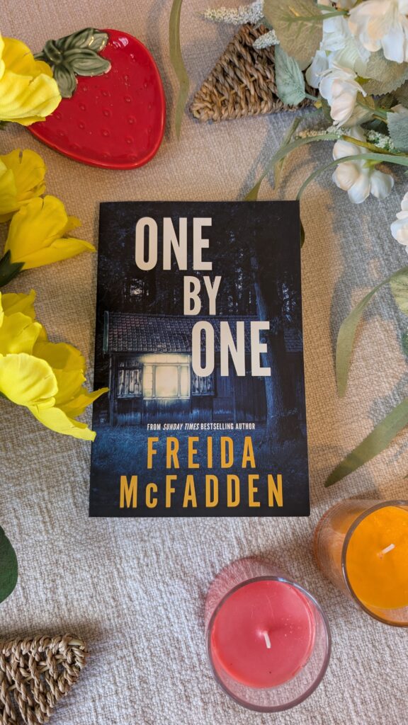 Book cover of one by one, by Freida McFadden.