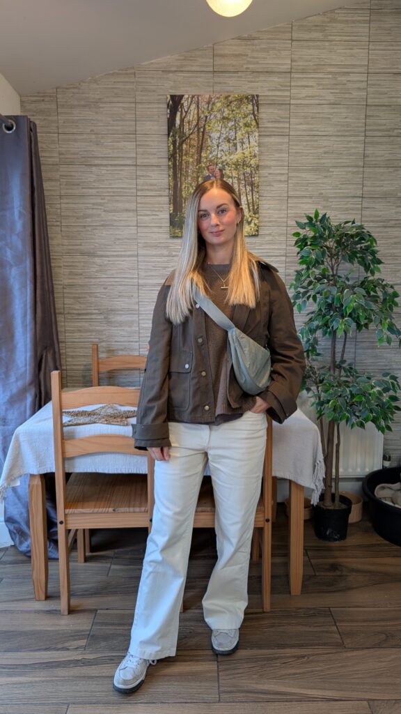 Claire Mac wearing a seasonal transitional outfit.