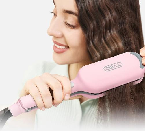 TYMO hair tool in use.