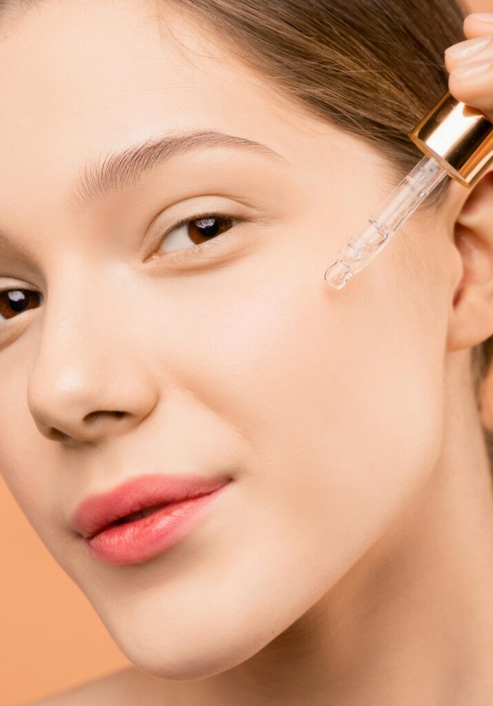 Woman using serum anti-ageing products as part of her skincare routine.