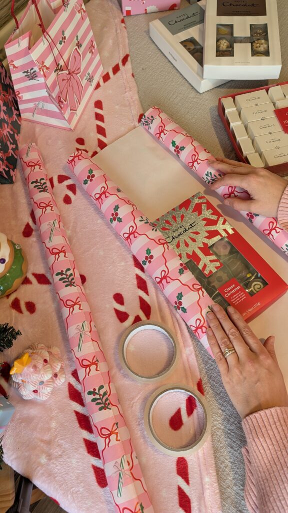 Wrapping Hotel Chocolate Christmas gifts.