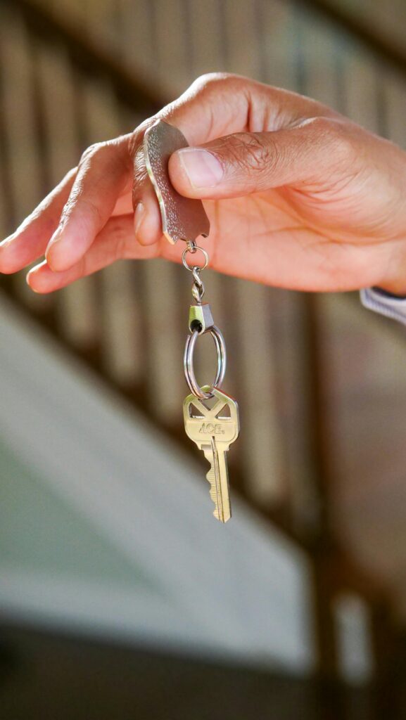 Person holding up a key. This is to go with an article about gaining an LTV mortgage.