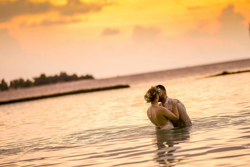Couple in the maldives enjoying a romantic escape.
