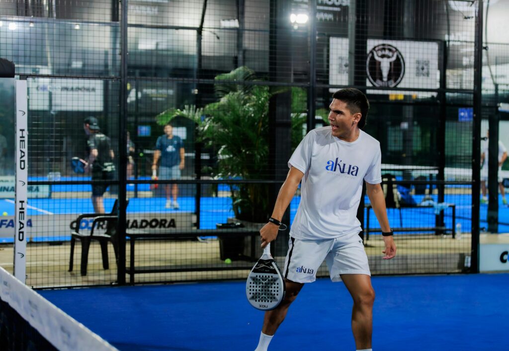 Man playing padel.