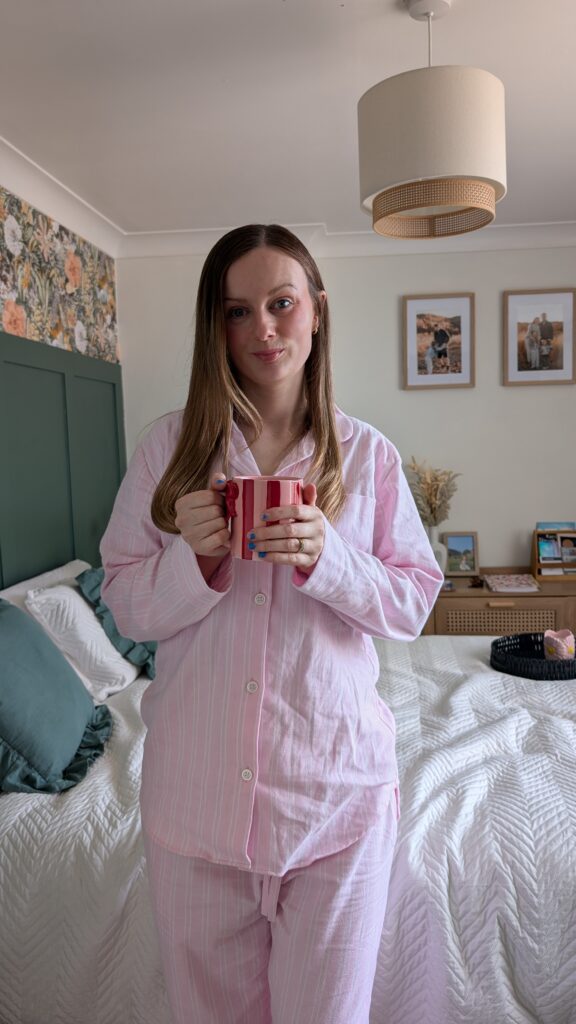 Claire Mac wearing pink striped pyjamas from British Boxers for their Mother's Day collaboration.