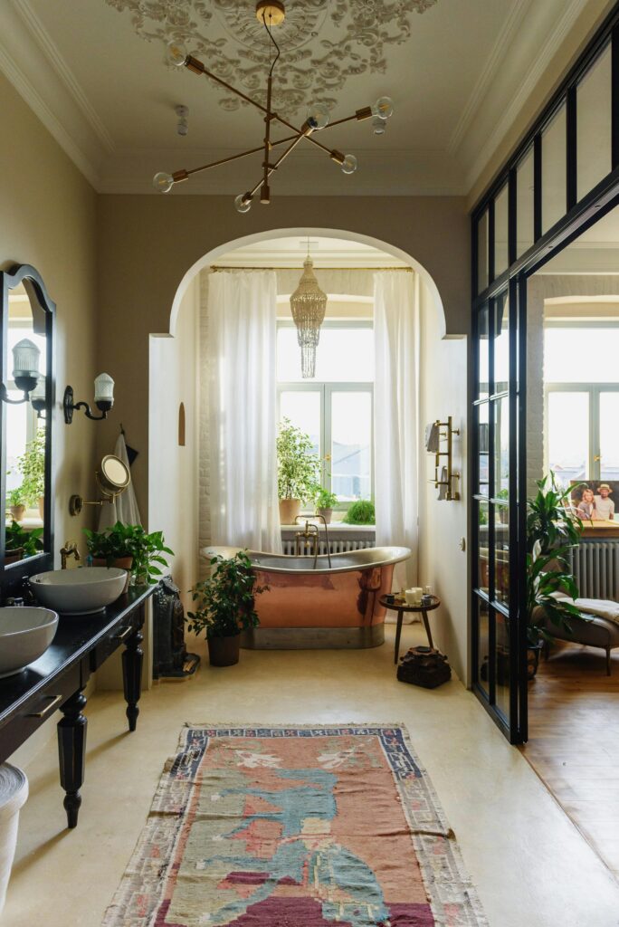 Bathroom styled with vintage decor pieces.