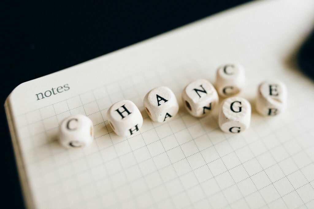 Personal change written on dice.