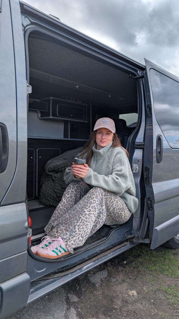 Spring layering outfits in a campervan in the North Yorkshire Moors.