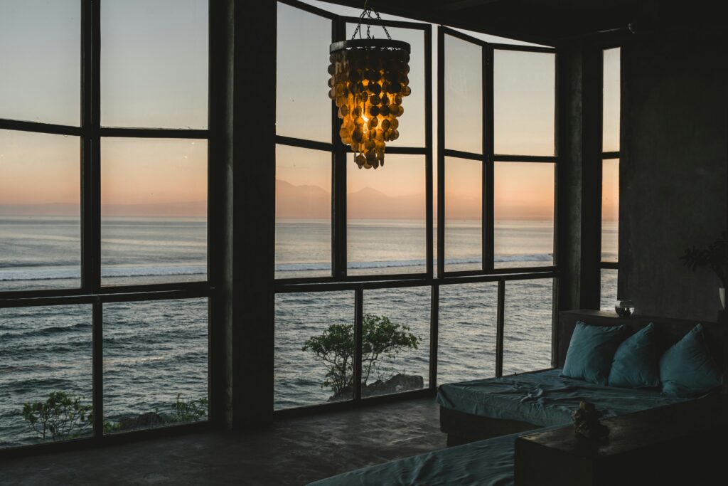 Coastal home. The view looking out of the window onto the sea.