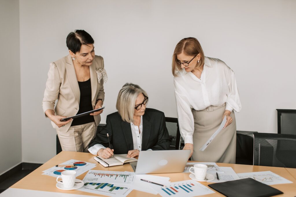 Businesswomen holding a meeting trying to boost business credibility.